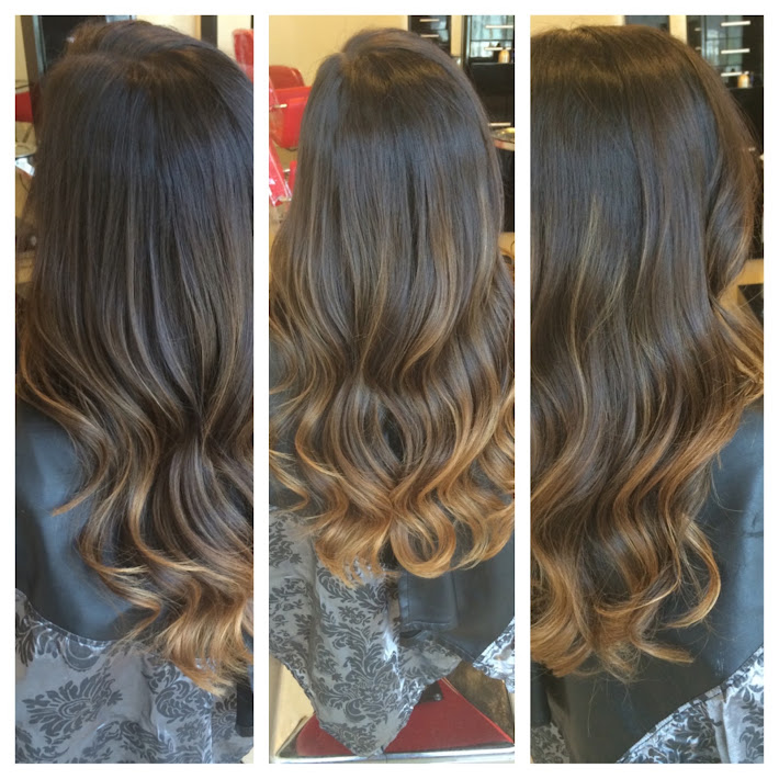 Dimensional brunette color and soft waves created at Art Palis Hair Studio